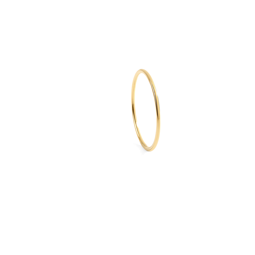 Gold ring on a white background
