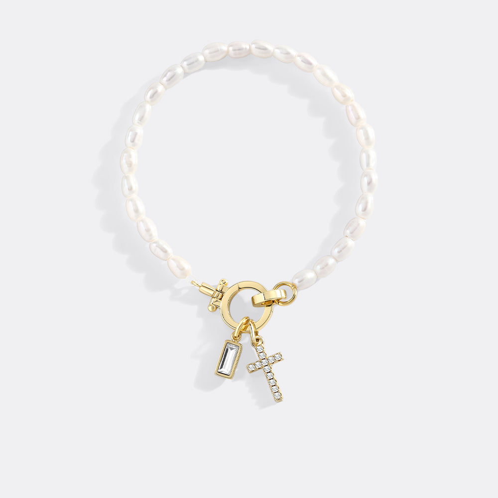 https://www.dropbox.com/scl/fi/tzq6e6ai40s5mrbn6cbi0/Pearl-Cross-Charm-Bracelet_4.jpg?rlkey=3lkn3yrjmibvsuz2rz1wc5sw8&st=tbxxz6rj&dl=0