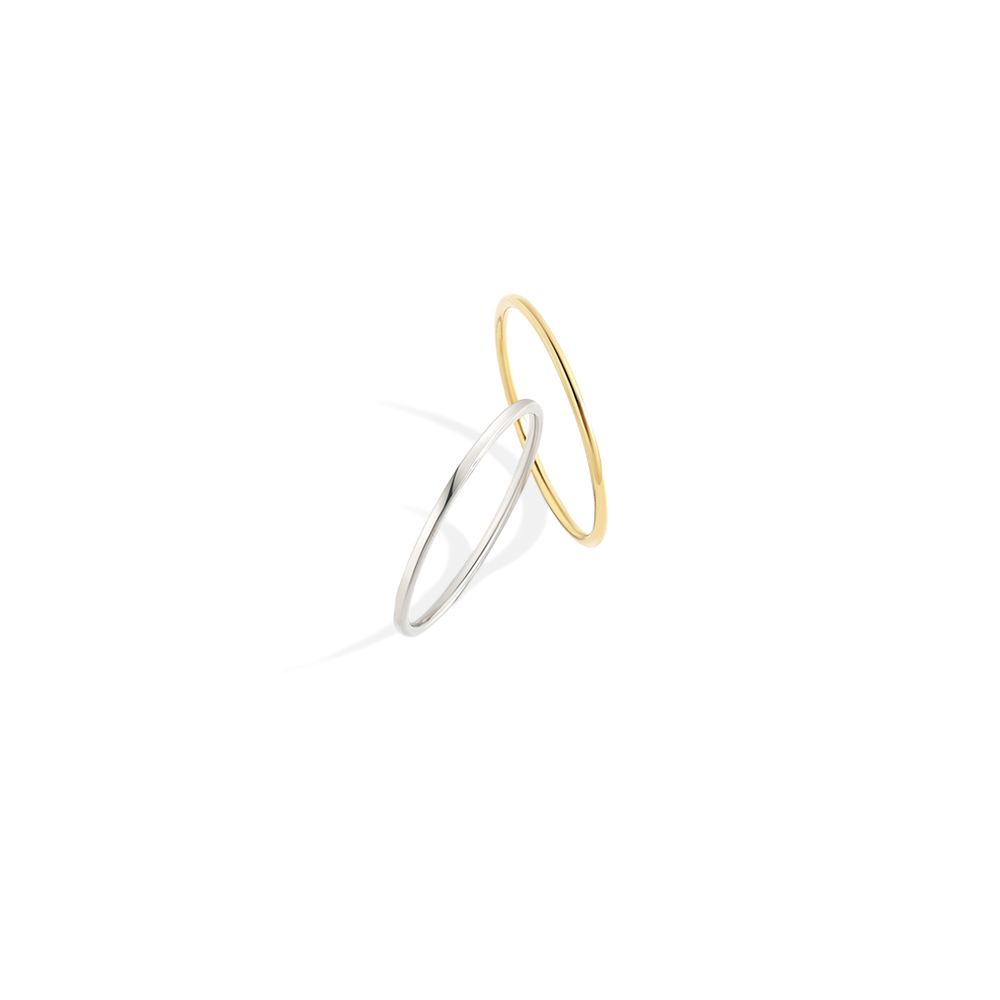 Two gold and silver rings on a white background