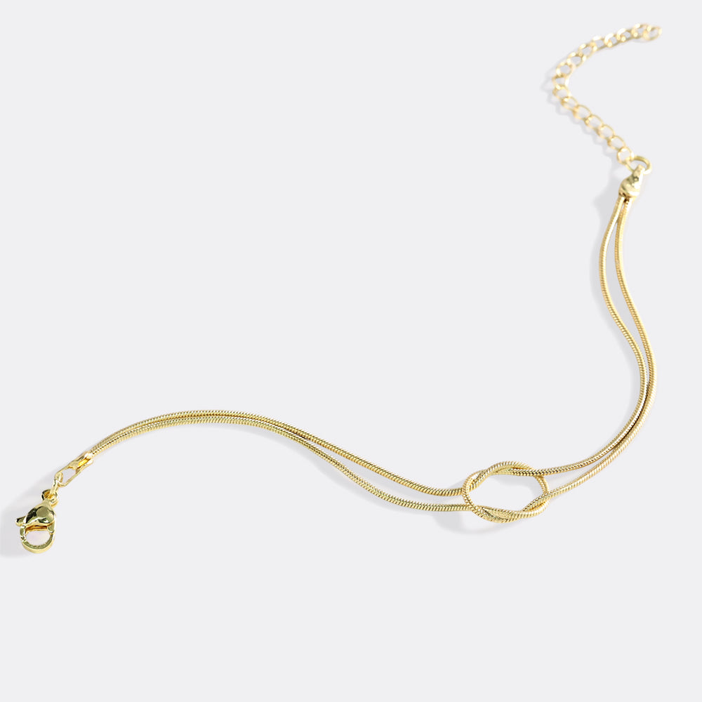 Gold necklace on a white background
