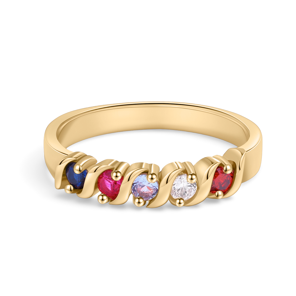 A gold-colored ring with a flowing wave design, featuring multicolored gemstones set along the band.