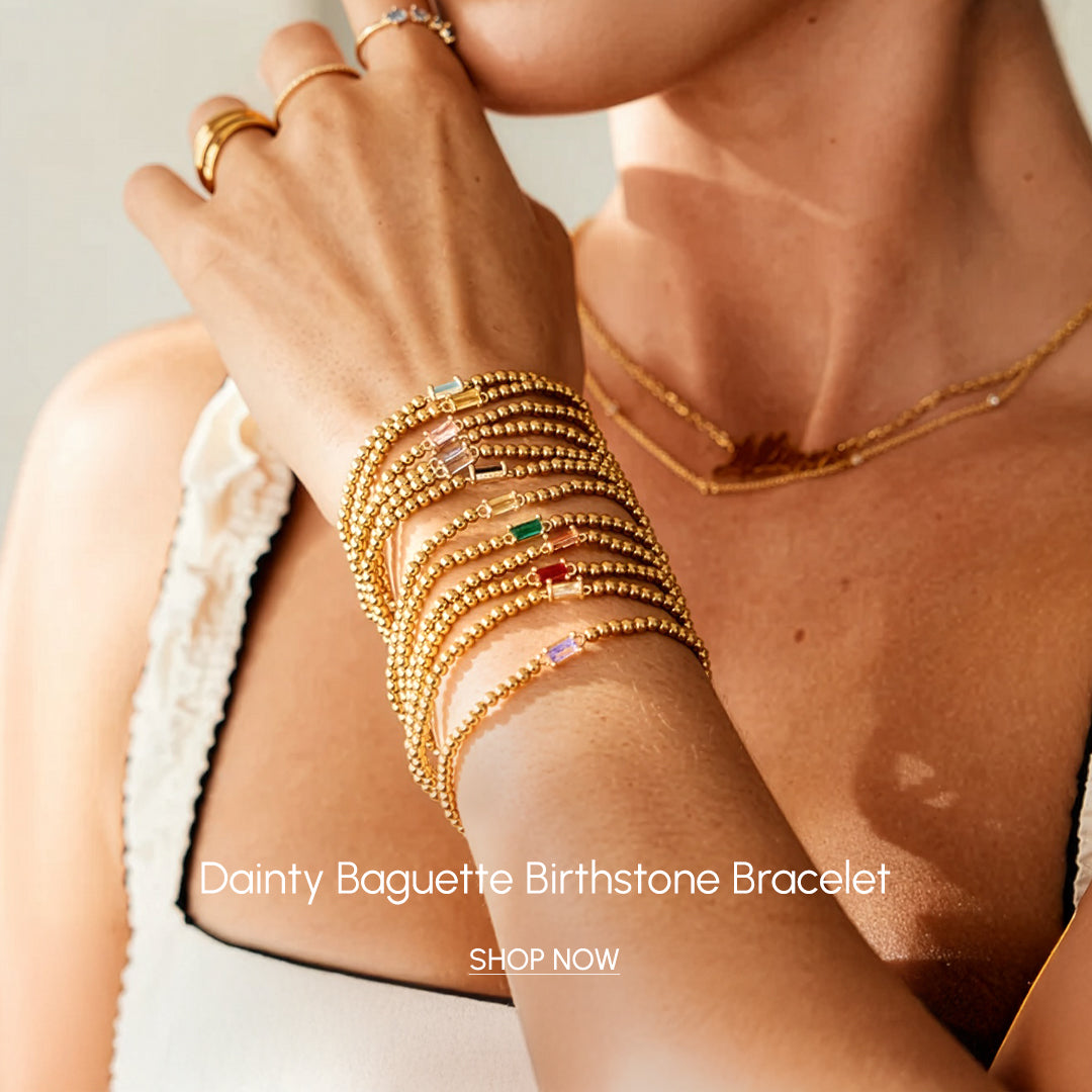 Woman wearing gold beaded birthstone bracelet — Mint & Lily