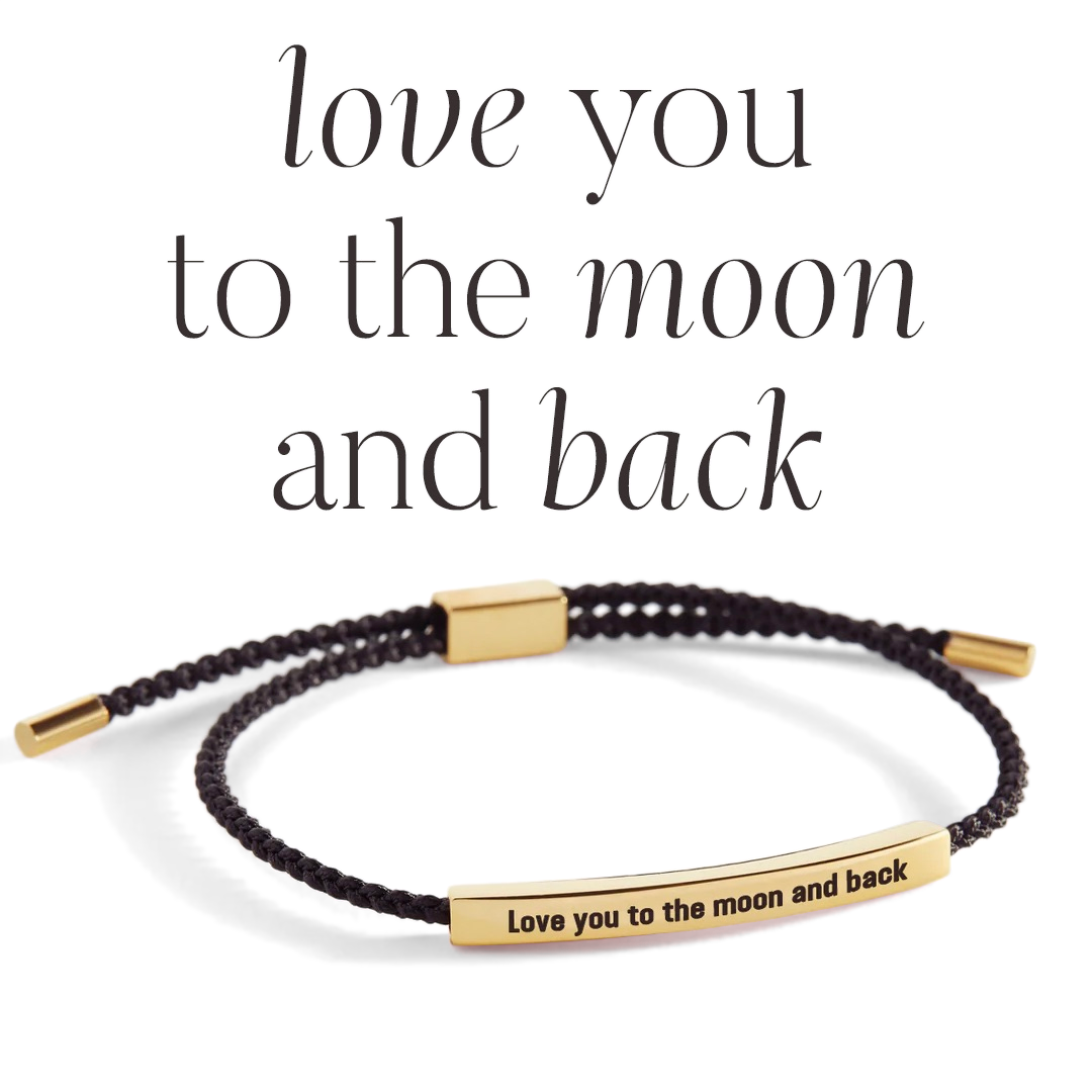 Bracelet with 'Love you to the moon and back' tag on a light background